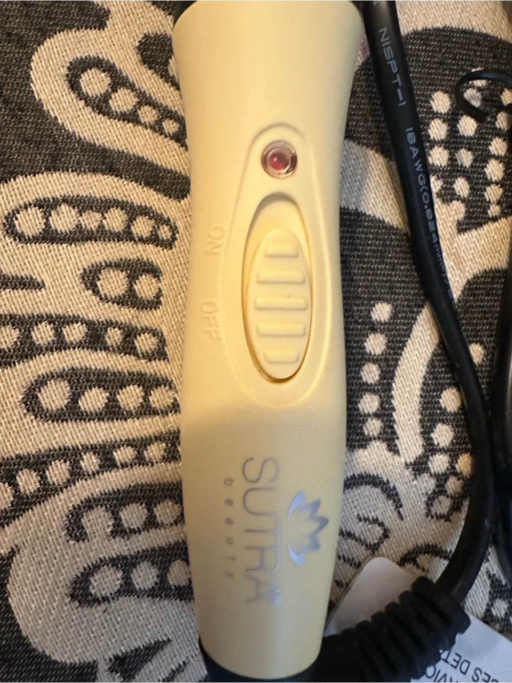 Never been used Sutra Compact Travel Curling Wand in Cream and Black